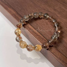 Load image into Gallery viewer, Black Gold Rutilated Quartz Crystal Bracelet: The Ultimate Stone of Protection &amp; Wealth
