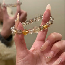Load image into Gallery viewer, Black Gold Rutilated Quartz Crystal Bracelet: The Ultimate Stone of Protection &amp; Wealth